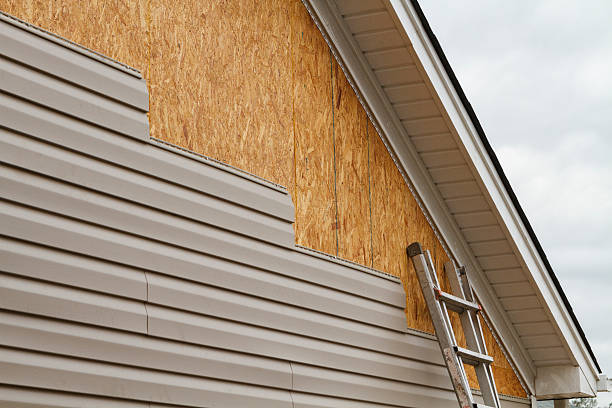 Professional Siding Installation technician working in Manchester, MD